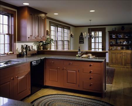 A kitchen with a sink and a window