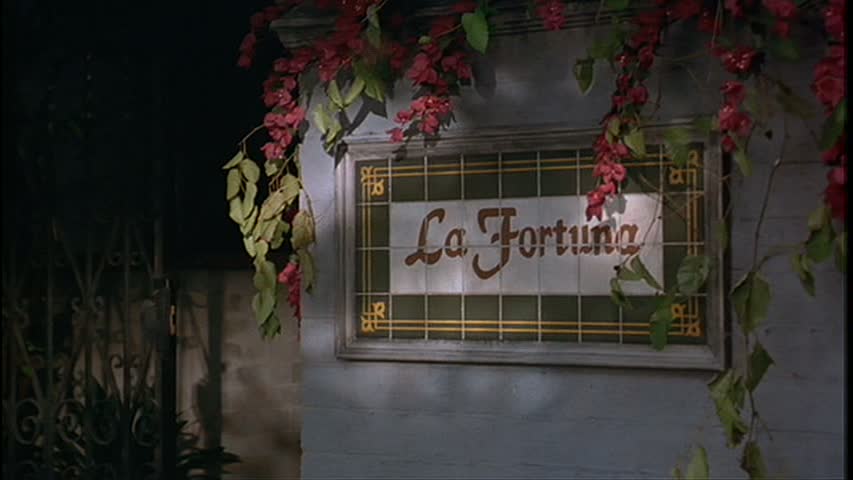 sign saying La Fortuna in front of apartment complex in 'Til There Was You movie