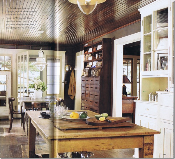 A dining room table in front of a window