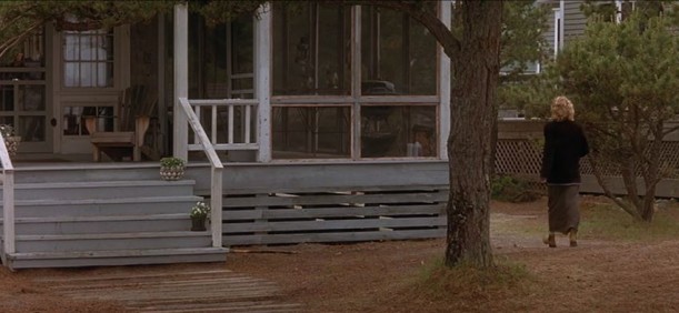 back exterior of house with screened porch