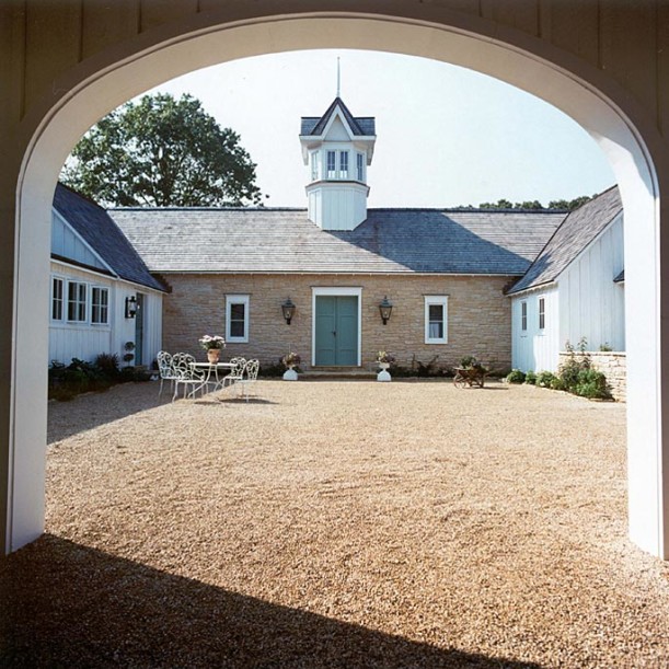 front exterior of French Country style farmhouse