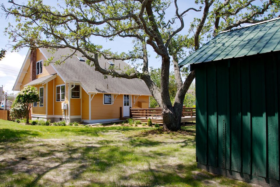 back of yellow cottage