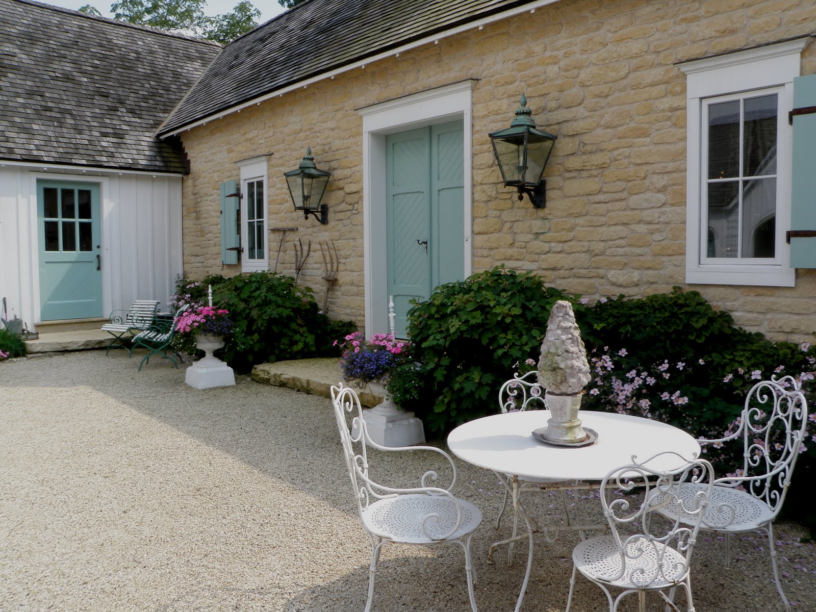 courtyard with table and chairs Hooked on Houses
