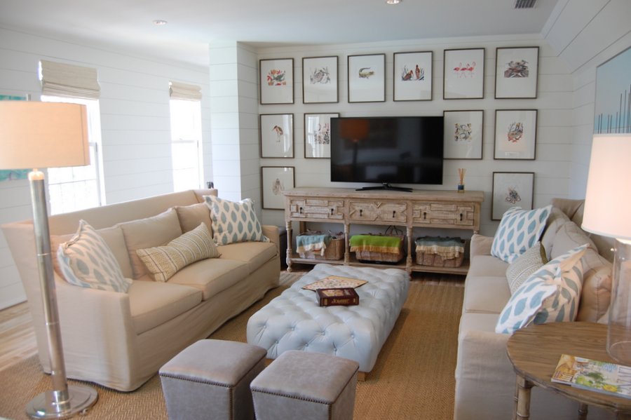 A living room filled with furniture and a TV