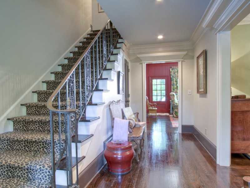 staircase with animal print carpet for runner