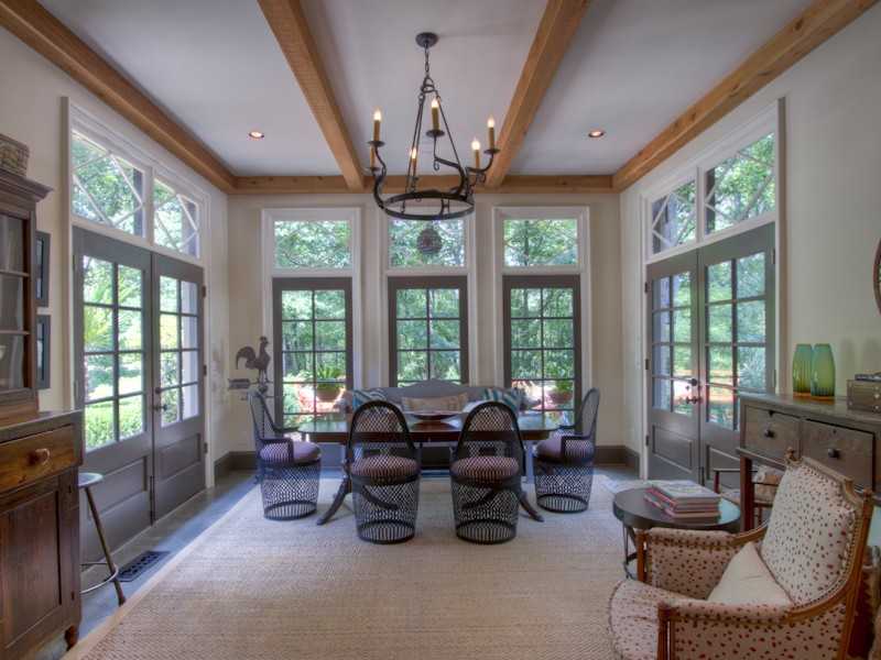 sunroom with beamed ceiling