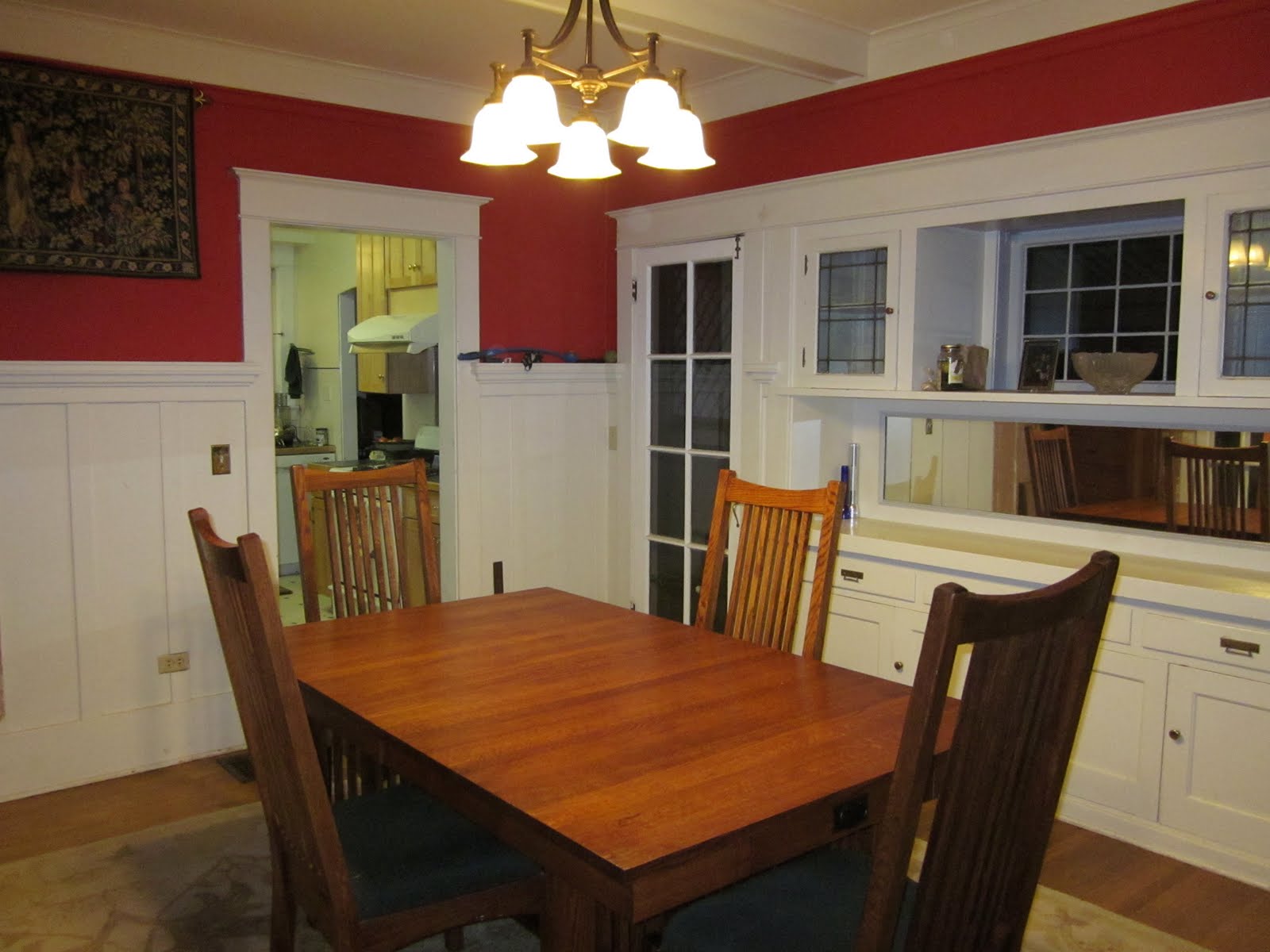 A dining room table in dining room before remodel