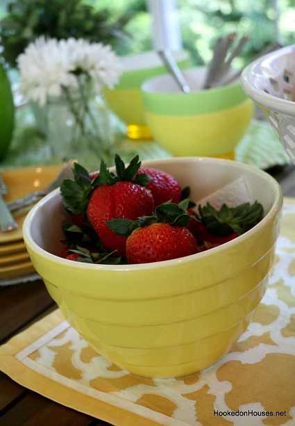 red strawberries in yellow bowl sunroom