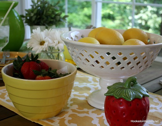 strawberries and lemons on sunroom table