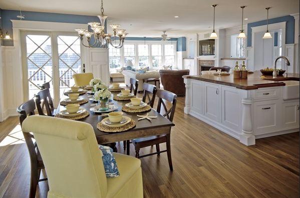 A kitchen with a dining room table