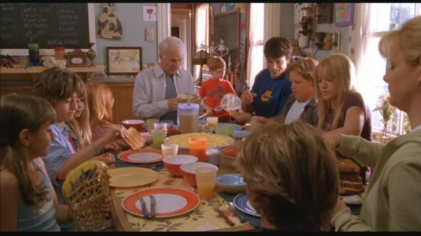 A group of people sitting at a table