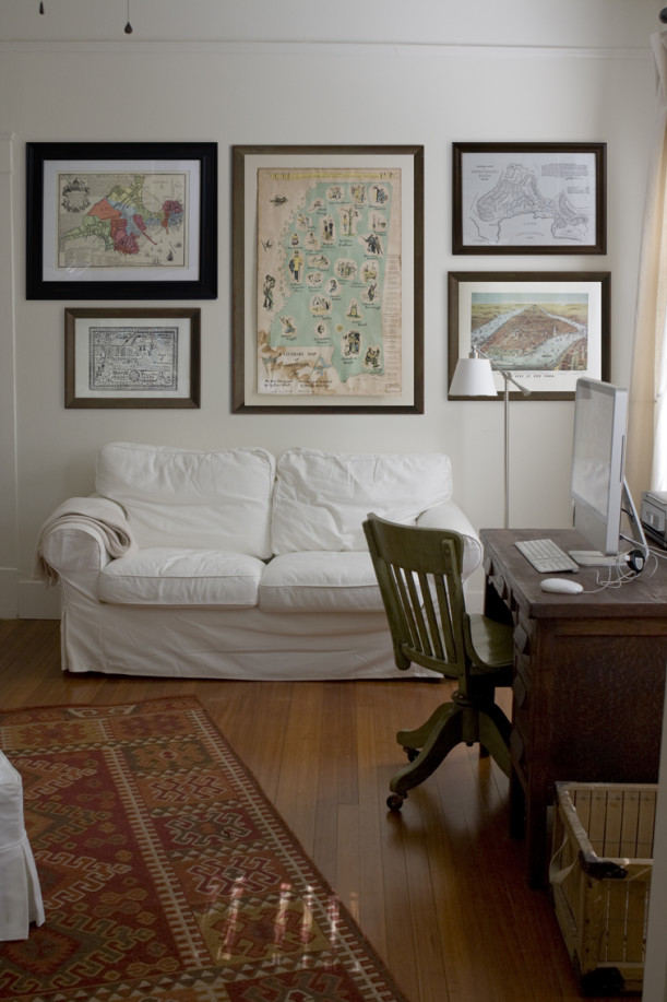 home office with slipcovered sofa and desk