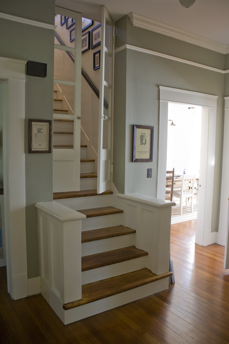 staircase with double doors halfway up