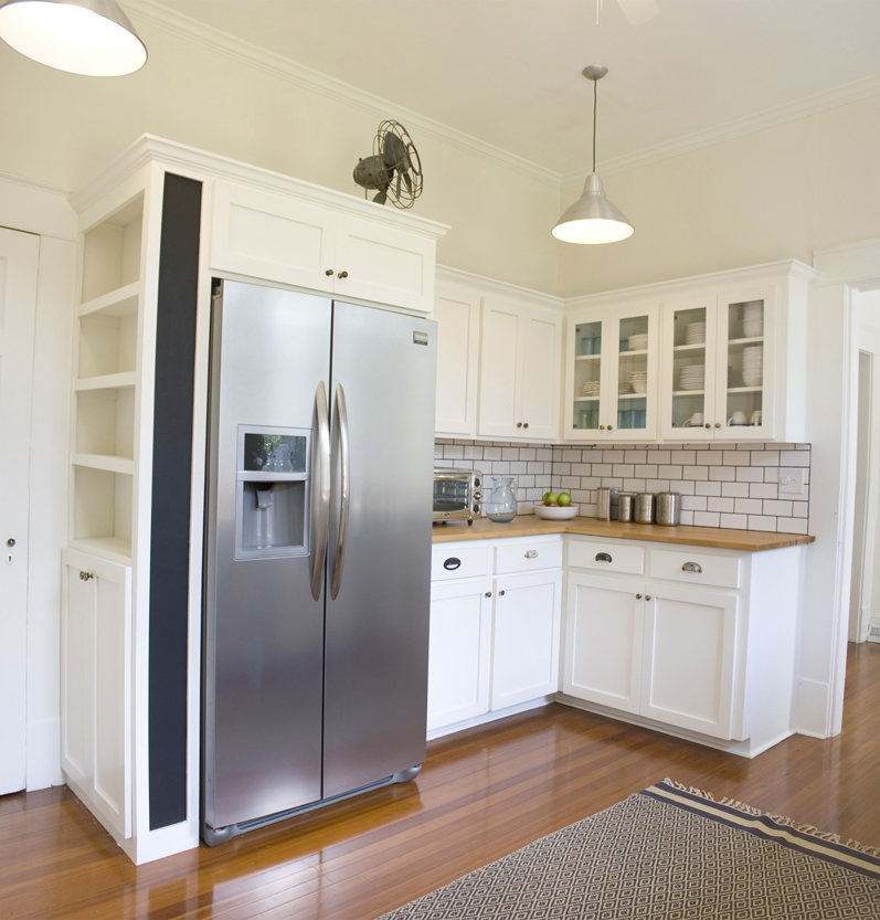 A stainless steel refrigerator in a kitchen