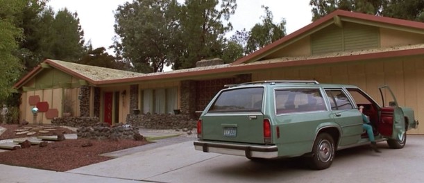 A car parked in front of a house