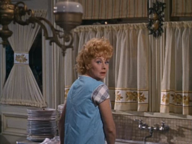 Lucille Ball standing at the sink in Yours Mine and Ours movie kitchen