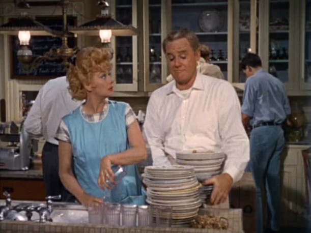 Lucille Ball and Henry Fonda washing dishes in the kitchen