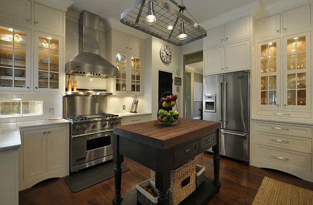 A large kitchen with stainless steel appliances