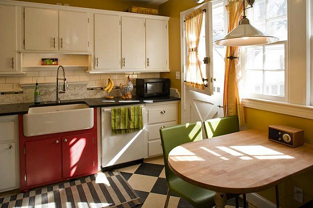 A kitchen with a dining table