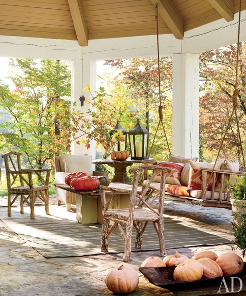 swing and outdoor seating on porch