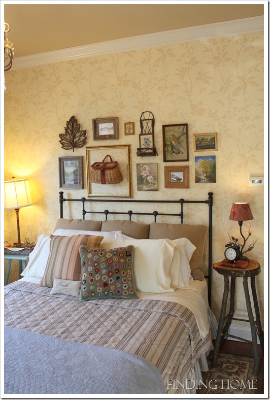 A bedroom with iron headboard