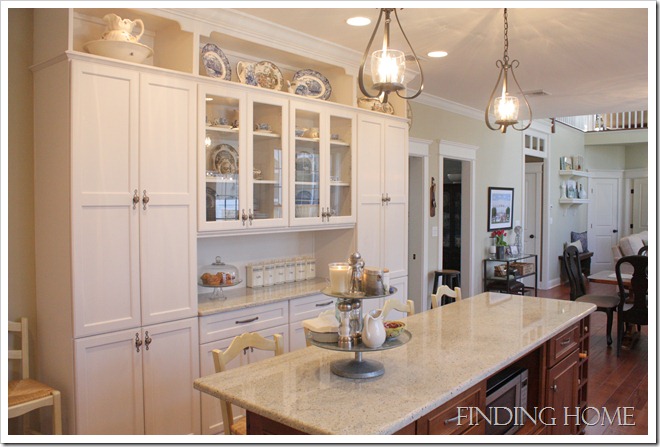 A kitchen with a sink and a window