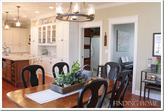 A kitchen with a dining table