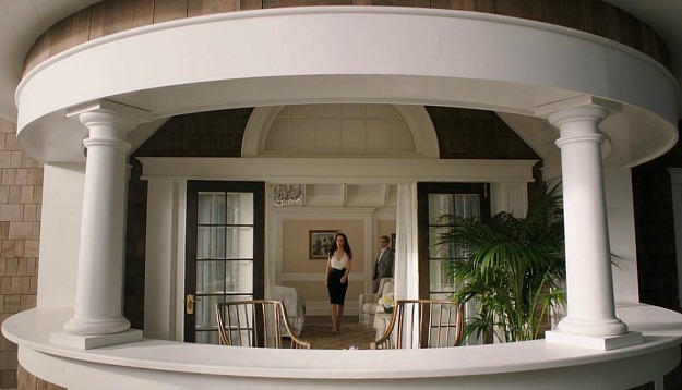 Victoria walking through her bedroom on her way to the turret balcony