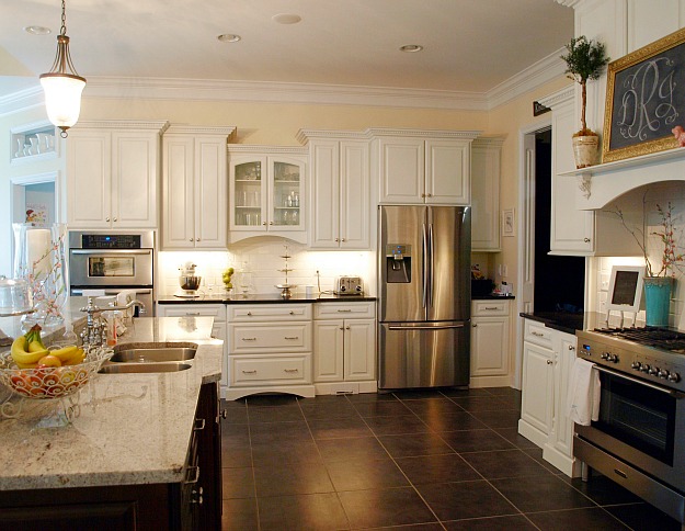 A large kitchen with stainless steel appliances