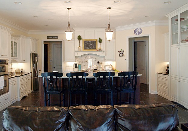 kitchen island with black barstools