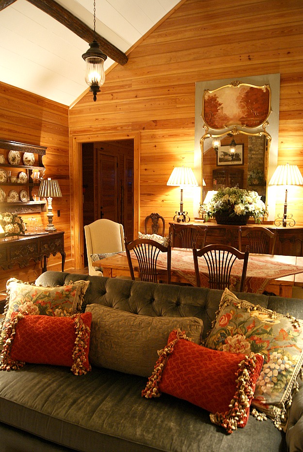 A living room filled with furniture and a fire place