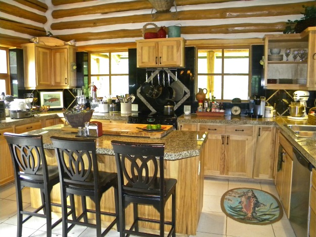 A kitchen in a log home