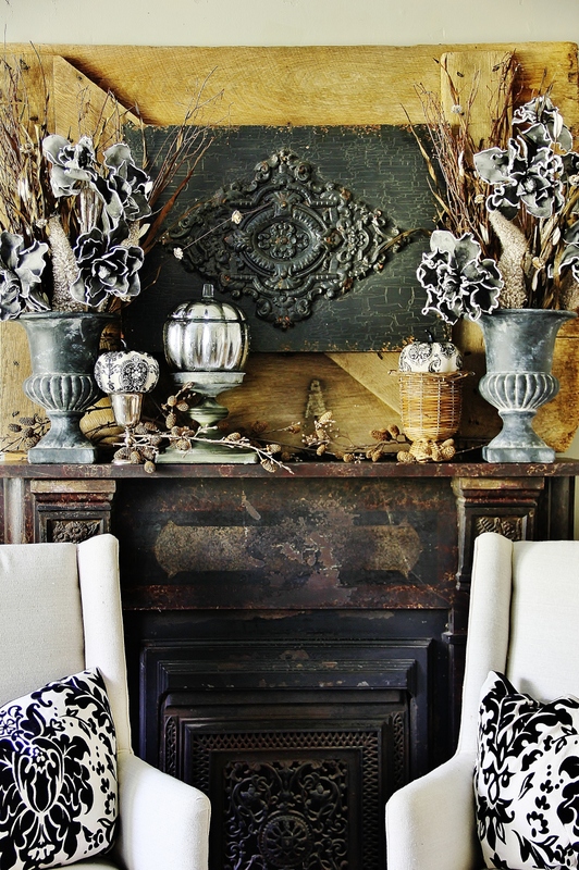 antique fireplace decorated for fall