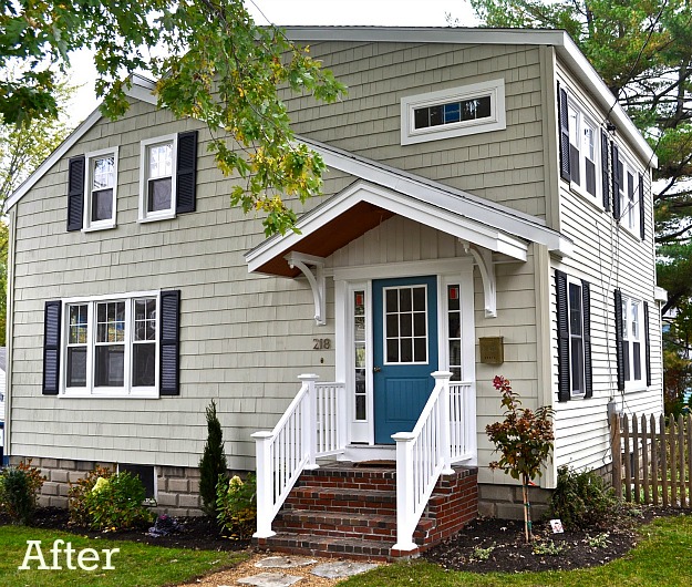 front exterior of house after makeover with blue door