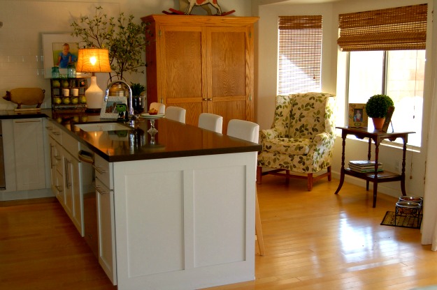 A kitchen with a wood floor