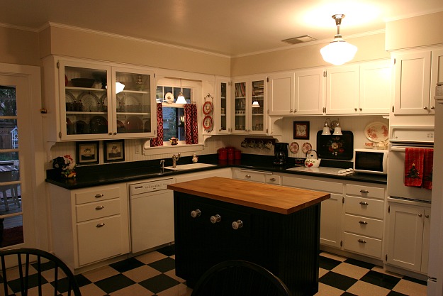 A kitchen with a stove top oven