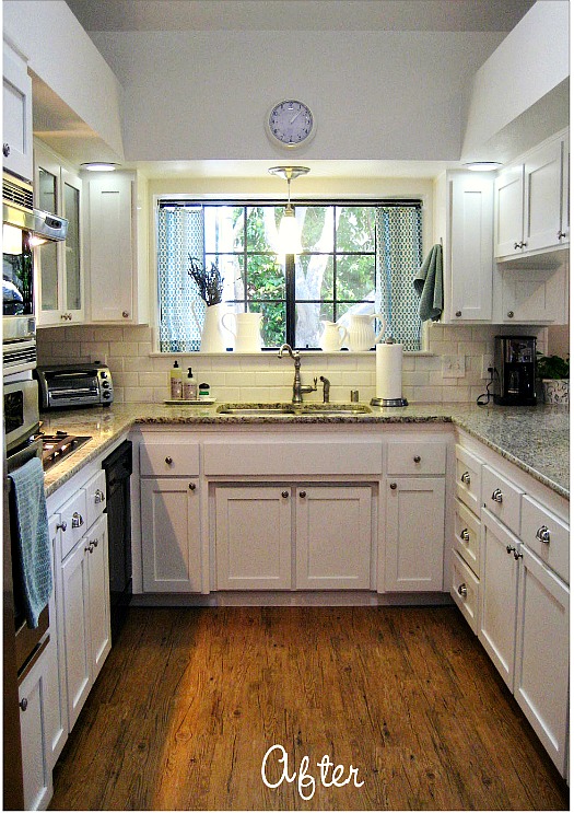 A kitchen with a sink and a window after remodel