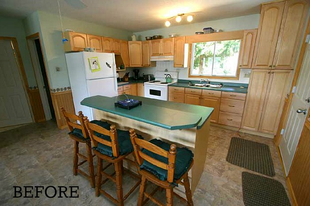 A kitchen with a wood floor