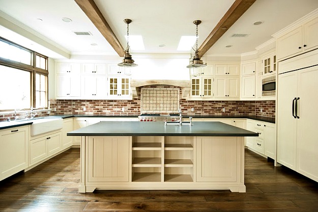 A kitchen with a wood floor