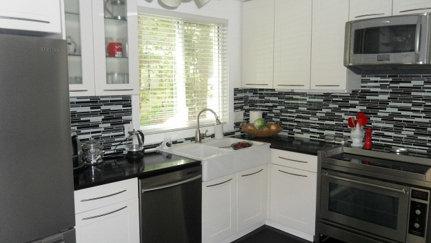 corner of black and white kitchen