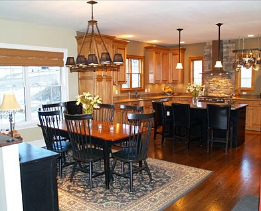 kitchen that isn\'t white with wood cabinets