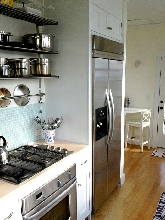 A stove top oven sitting inside of a kitchen