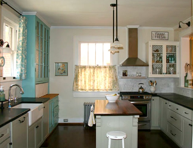 A kitchen with a sink and a window