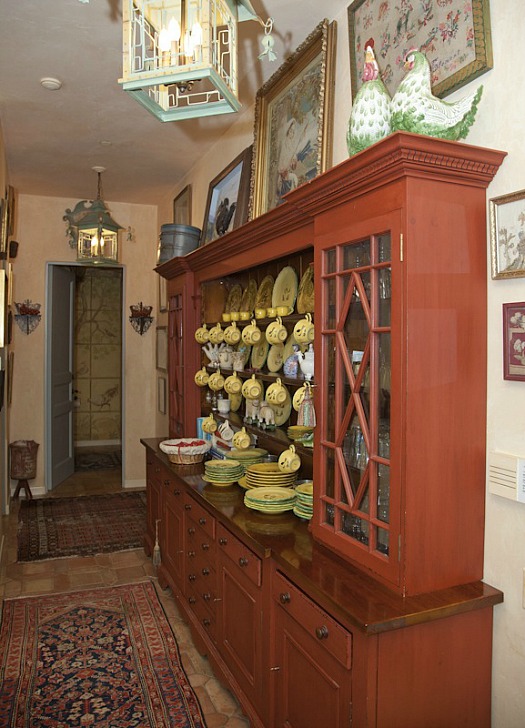 A kitchen with wooden cabinets