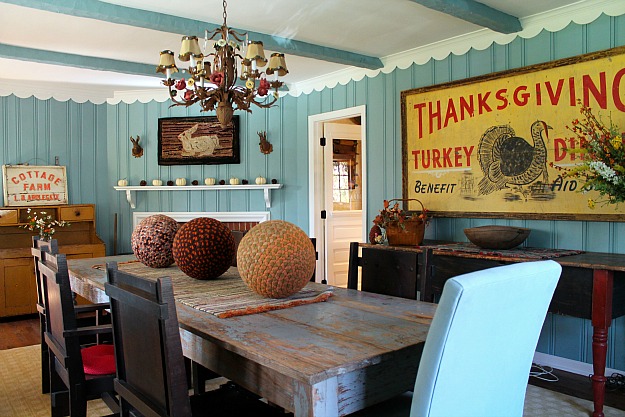 dining room table with large decorative balls