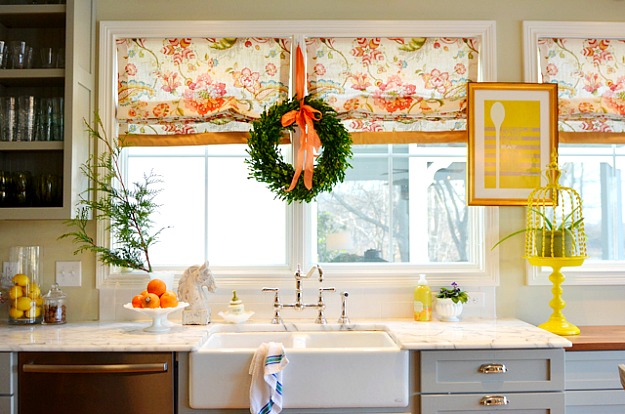 A kitchen with a sink and a window