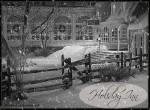 front exterior of Holiday Inn covered in snow from classic black and white movie