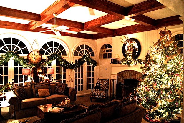 A living room filled with furniture and a fire place