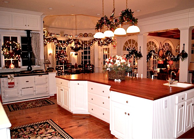 A kitchen with an island in the middle of a room