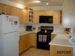 A kitchen with a stove sink and refrigerator before remodel